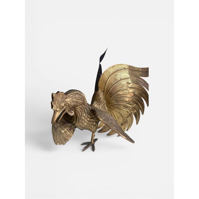 The product is a vintage solid brass fighting rooster sculpture. These figurines is well constructed and showcase...