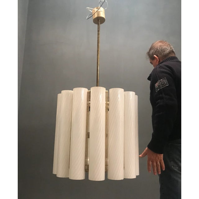 Large Venini Murano White Swirl Glass Chandelier. Composed of 13 Large handblown white swirl Murano Glass tubes. Murano...