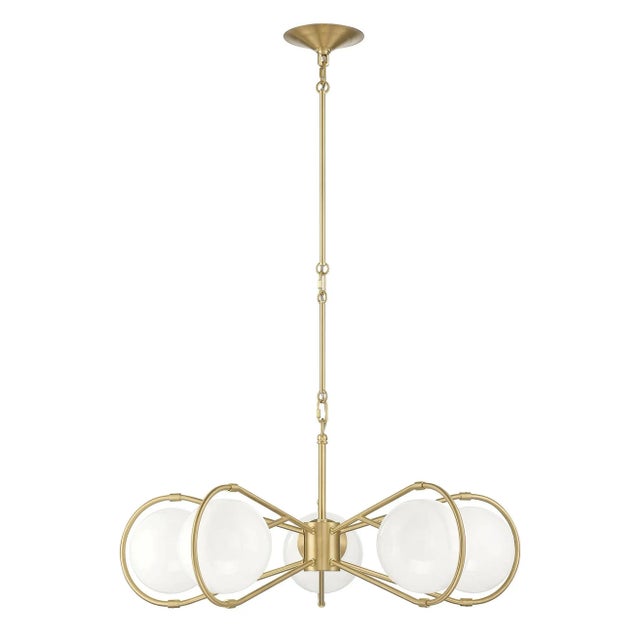 Mid-century modern in sensibility, the Gio 5-Light Chandelier is defined by the five white glass globes that are...