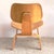 This is the Eames Molded Plywood Lounge Chair with Wood Base (LCW), designed by the legendary husband-and-wife duo Charles...