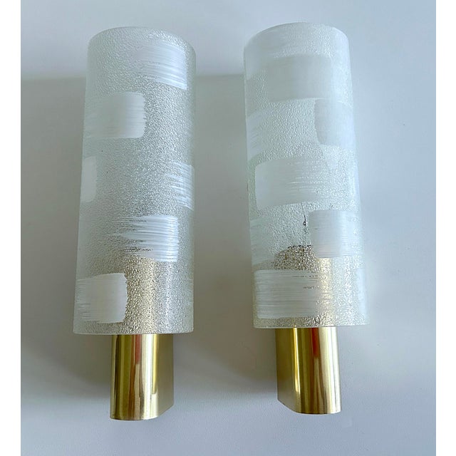 Pair of Vintage mid century sconces with frosted plexiglas shades mounted on metal structure with brass cover Dimensions...