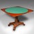 This is an antique fold-over parlour card table. An English, mahogany games or side table, dating to the William IV...