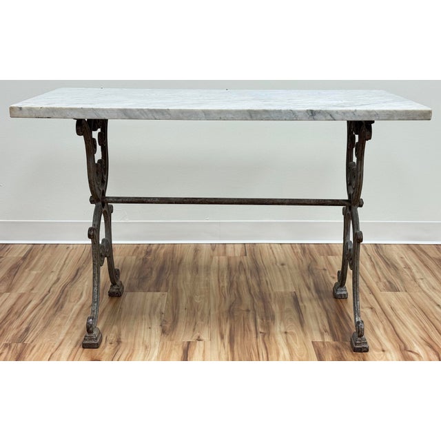 Vintage French cast iron marble top bistro table with rectangular white marble top. Ideal for outdoor use. Marble top...