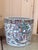 This is a beautifully decorated Chinese Famille Rose porcelain jardiniere, richly adorned with hand painted scenes of...