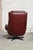 Pair of leather swivel armchairs with ottomans. Remains in great condition. I have official proof of authenticity such as...