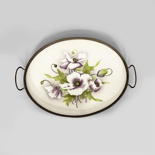 Italian Art Deco tray with flowers in ceramic and metal, 1920s Oval serving tray with a ceramic surface featuring a...