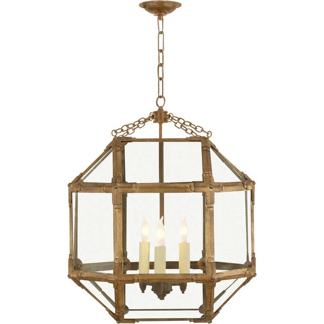 Morris Medium Lantern in Gilded Iron with Clear Glass Designer: Suzanne Kasler Canopy: 4.75" Round Mounting: Chain Shade...