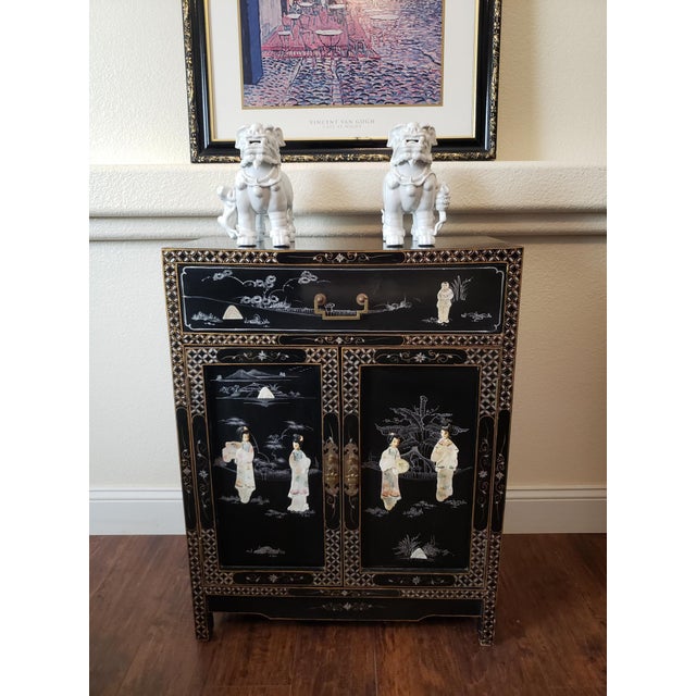A striking pair of vintage Blanc de Chine Foo Dogs, crafted in classic Dehua-style white porcelain. These guardian lions...
