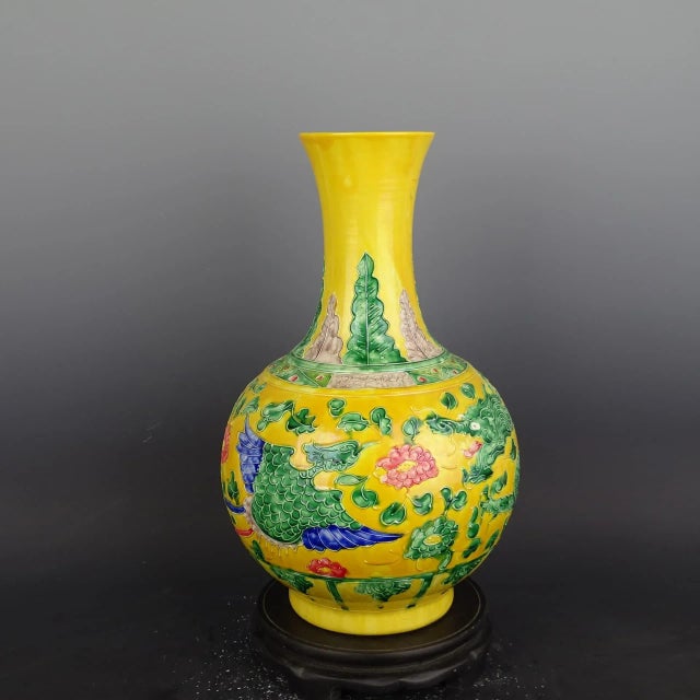 W-25cm,H-38cm This product is a stunning Yellow Ground Famille Verte Porcelain Vase featuring intricate Dragon Phoenix...