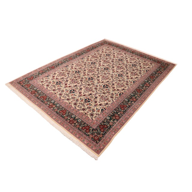 Designed with mesmerizing intricacy and gorgeous color palette, this hand-knotted masterpiece demonstrates the beauty and...