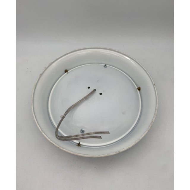 Lamps attributed to Fontana Arte. Sold as a pair. Ceiling or wall lamp, featuring a simple and functional design typical...