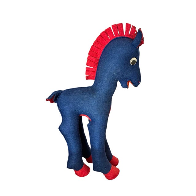 A charming, antique SMU mascot doll. Features the Southern Methodist University mustang mascot, Peruna. Felted wool body...