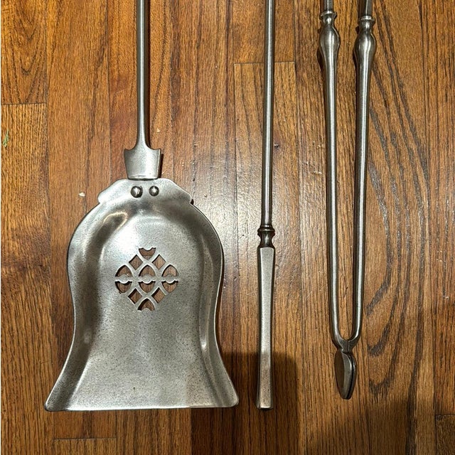 English 19th c steel fireplace set. 24”h shovel 6.5” w 42-011