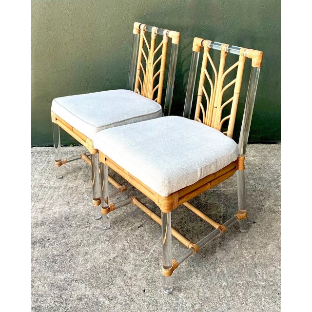 Seamlessly marrying organic warmth with sleek, contemporary minimalism, this rare pair of side chairs by Selamat makes an...