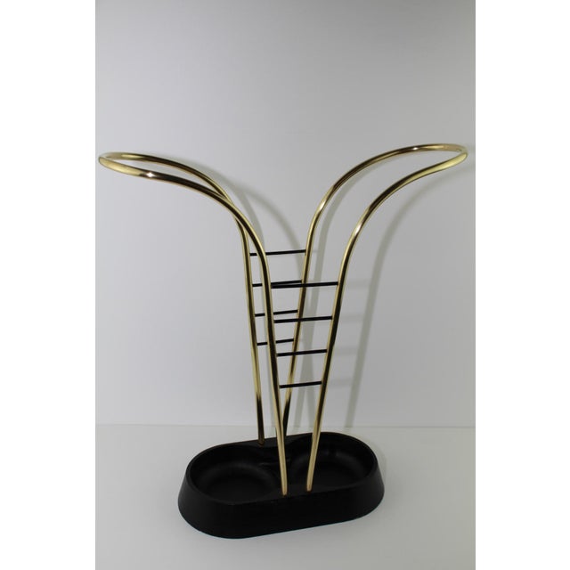 Umbrella stand with severe Gußeisenbasis, this painted black, elegant brass frame, div. Floor signatures foundry temple,...