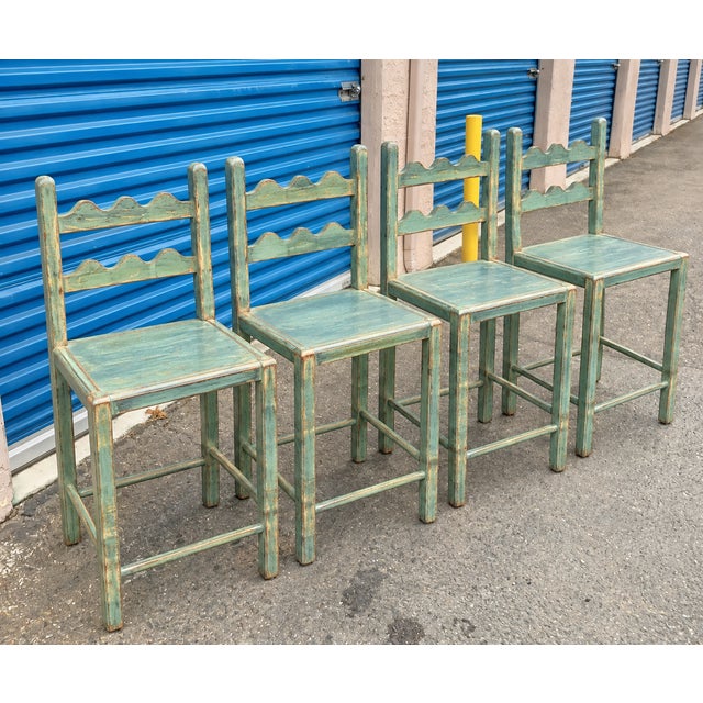 Set of 4 country French solid oak counter stools. . Stools are done in a rich Antique seafoam green distressed finish by...