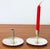 This sweet pair of Danish silver plated candlesticks have a curved base that is slightly elevated to function as a...