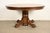 An outstanding antique Victorian, American Empire, or Renaissance Revival split pedestal extension dining table In the...