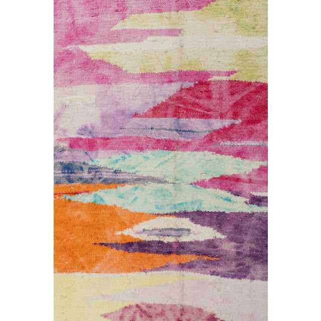 The Prism Moroccan Boucherouite Rug is a captivating tapestry of vibrant hues and artistic expression. Crafted using...
