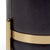 The bruce stool is wrapped in a deep midnight blue leather that is a mix of navy and purple and accented with brass plated...