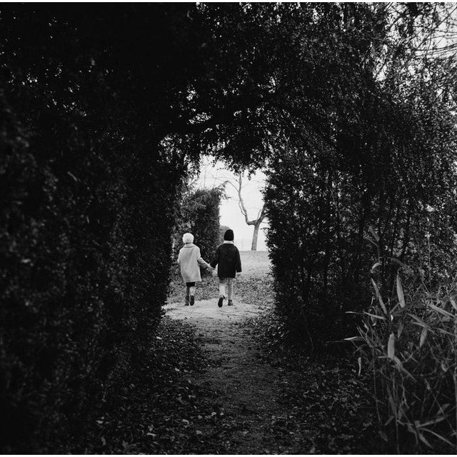 Little Friends Two children walking hand in hand through a park, circa 1965. (Photo by Archive Photos/Getty Images) Paper...
