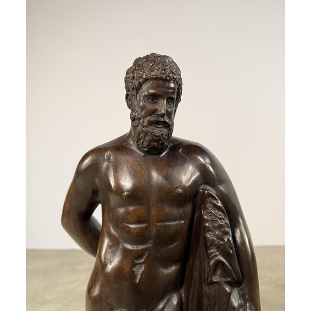 Bronze sculpture of Hercules (Heracles), inspired by the iconic Farnese Hercules, one of the most celebrated sculptural...
