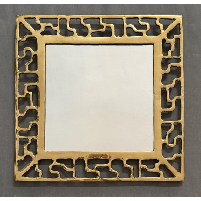 David Marshall Brutalist Mirror, Signed. Vintage, Labyrinth model. Made of bronze, with external dimensions of 59 x 59 cm....