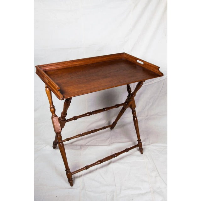 English Butlers Oak Tray With Stand. With removable handled tray top and collapsible base. The stand has turned legs. A...