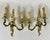 Introduce a touch of French elegance to your home with this exquisite pair of vintage gilt bronze sconces. Originating...
