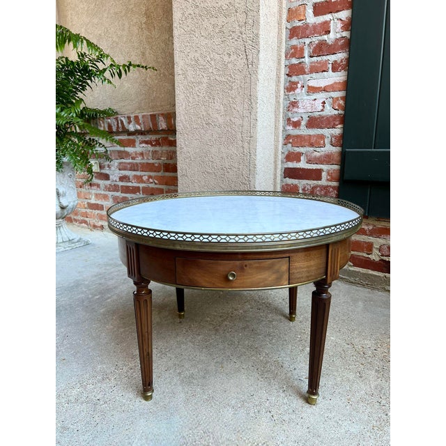 Antique French Round Bouillotte Side Table White Marble Louis XVI Style Gueridon. Direct from France, a fabulous round...