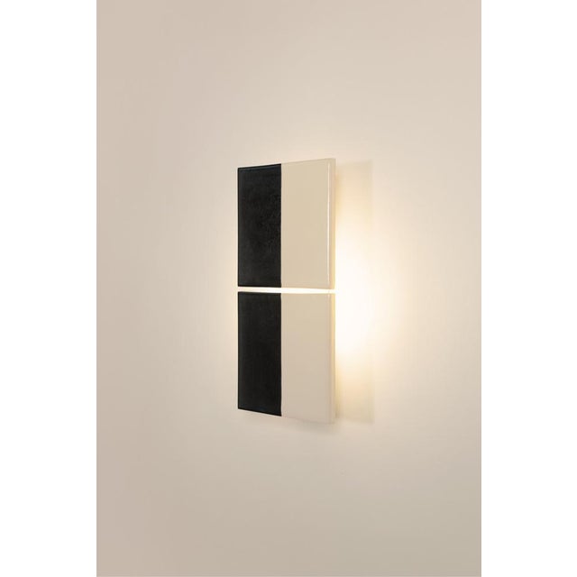 Tile(s) is a collection of wall lights produced in collaboration with ceramic tiles designer Marianne Smink. They provide...