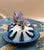 A finely hand-crafted ceramic butter dish by Ardmore Ceramics, South Africa, featuring an exquisitely sculpted and painted...