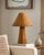 Illuminate your space with the Maroya accent table lamp, a captivating blend of traditional style and natural materials....