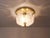 A beautiful ceiling light or flush mount from the 1970s, executed by Limburg, Germany. It has a brass base with three...