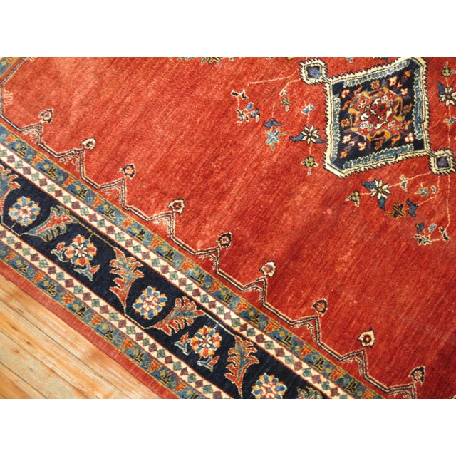 A 21st century Persian Bidjar rug woven with 100 % hand-spun vegetable dyed wool derived from a design and colors of an...