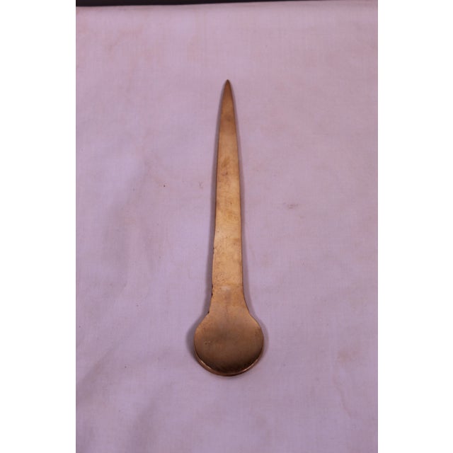 Vintage letter opener in brass with the Ancient Macedonia Royal Symbol or “Vergina Star”.