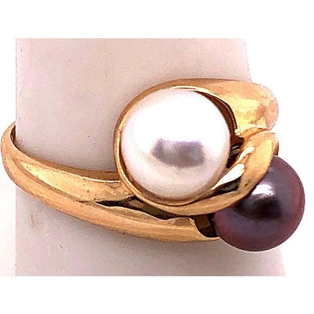 14 Karat Yellow Gold White and Black Pearl Free Form Ring 2 piece cultured pearls 6.00 by 6.00 mm Size 9.5 4 grams total...