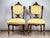 This fine pair of antique American side chairs dates to the late 19th century and is executed in the Renaissance Revival...