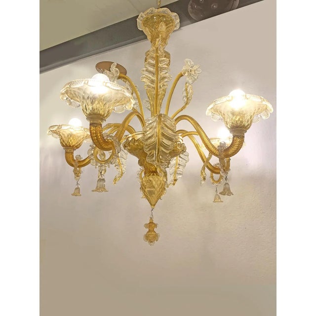Venetian Murano-Style Chandelier in Transparent and Amber Glass by Simoeng, in Exhibition Piece conditions. Designed from...