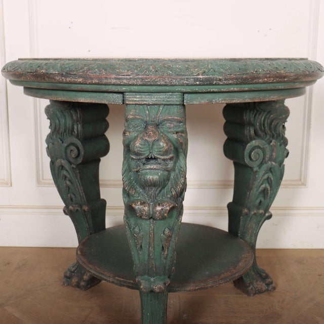 Unusual 19th century German carved and painted oak lamp table. 1890. This piece is designed in the style of the selected...