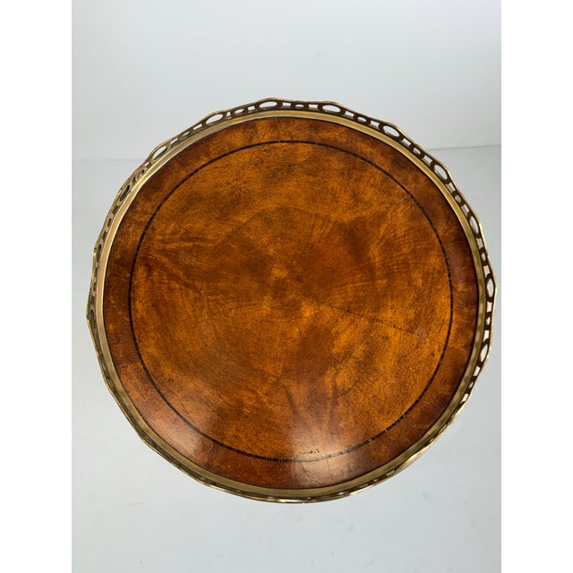 Telescopic Accent Table by Theodore Alexander. Mahogany with inlaid detail - brass circular gallery edge with wonderful...