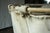 Vintage canvas laundry bag on metal frame. Constructed for Morris & Co Laundry, Groveville, NJ in 1924. Company logo on bag.