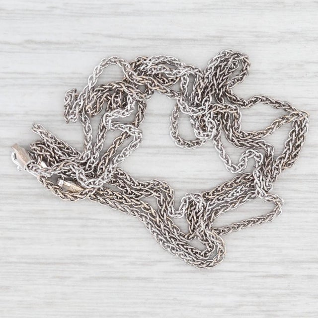 Metal: 14k White Gold Weight: 8.1 Grams Stamps: 14k Chain Style: Wheat Chain Closure: Lobster Clasp Length: 29 3/4" Width:...