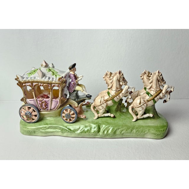 Charming vintage Italian porcelain figurine depicting a fairytale Cinderella-style royal carriage drawn by four...