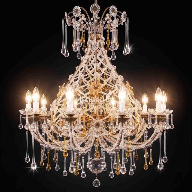 Antique 10-light Clear Crystal Chandelier with Amber Drops, 1950. Crafted from a circular brass cage-shaped structure...