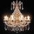Antique 10-light Clear Crystal Chandelier with Amber Drops, 1950. Crafted from a circular brass cage-shaped structure...