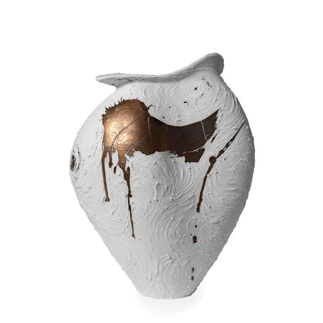 With its gently rising lip and curving silhouette, this sculptural vessel moves with quiet elegance. Part of Beverly...