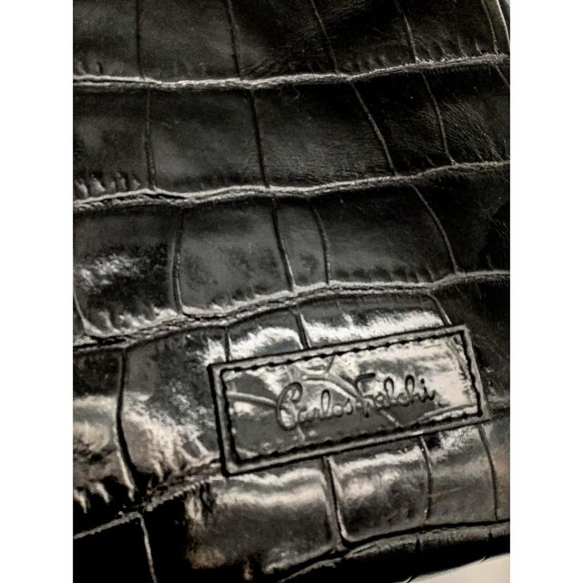 Fabulous large eye-catching genuine stamped alligator handbag from the 80's by "Carlos Falchi". His handbags are known for...