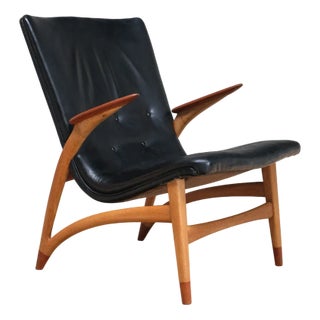 Lounge Chair in Black Leather, Oak & Teak by Arne Hovmand Olsen for J.L. Møllers, Denmark, 1952 For Sale