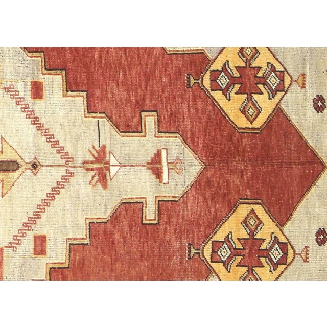 1960s Turkish Oushak Rug. Handwoven with wool on wool foundation in the Oushak region of Western Turkey. The Anatolian...